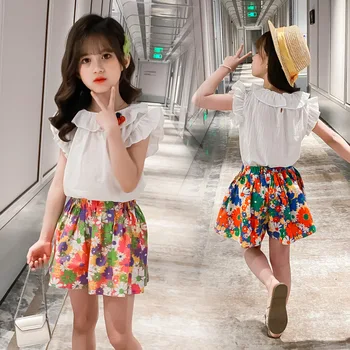 2021 Garota Verão Adequar a Nova Garota-coreano Moda Menina Bonito Boneca Gola Manga Curta + Flor de Saia 2Pcs de Roupas infantis